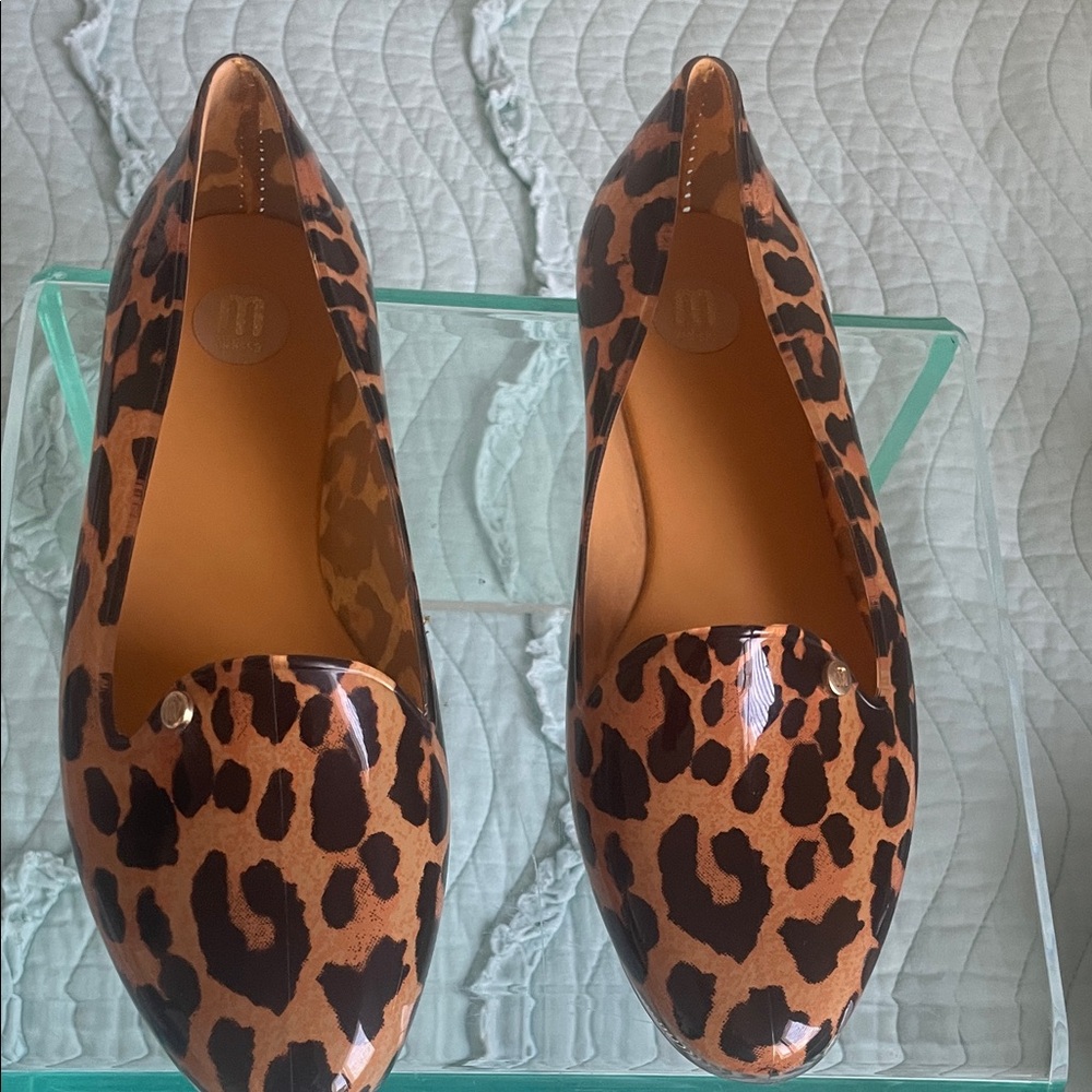 Melissa women’s leopard print slip on jelly flats.